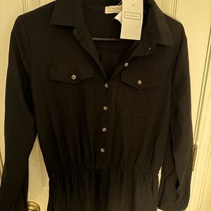Cute black jumpsuit by Ninexis. Never worn. New with tags.